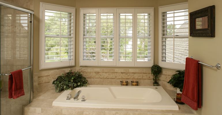 Plantation shutters in Raleigh bathroom.